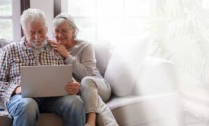 elderly couple looking at healthcare options